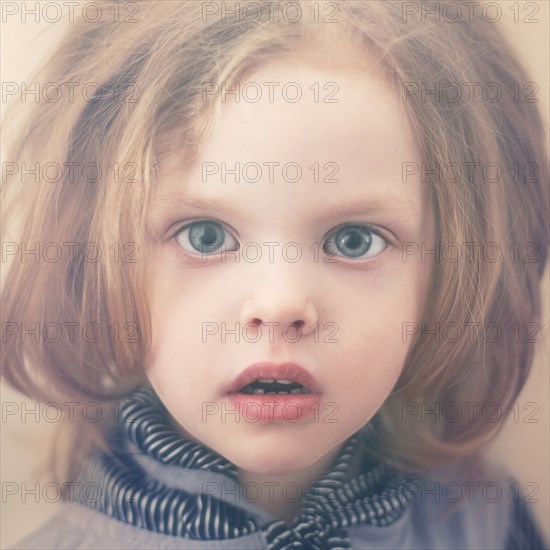 Close up of Caucasian girl with surprised expression