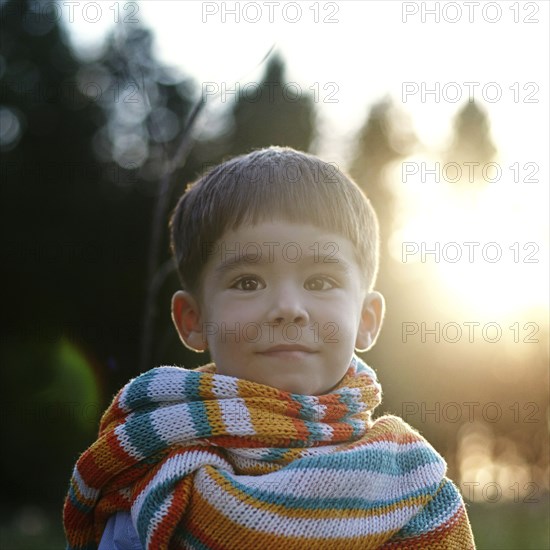 Portrait of Caucasian girl wearing multicolor scarf