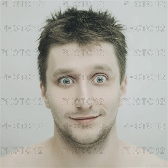 Portrait of wide-eyed Caucasian man