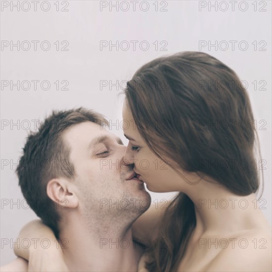Portrait of kissing Caucasian couple