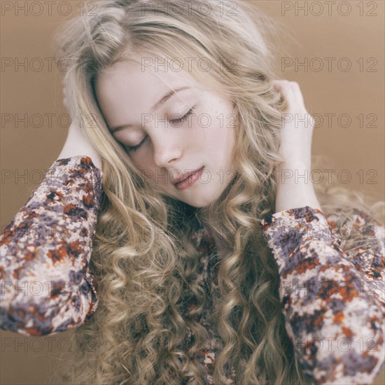 Portrait of Caucasian teenage girl with blonde hair