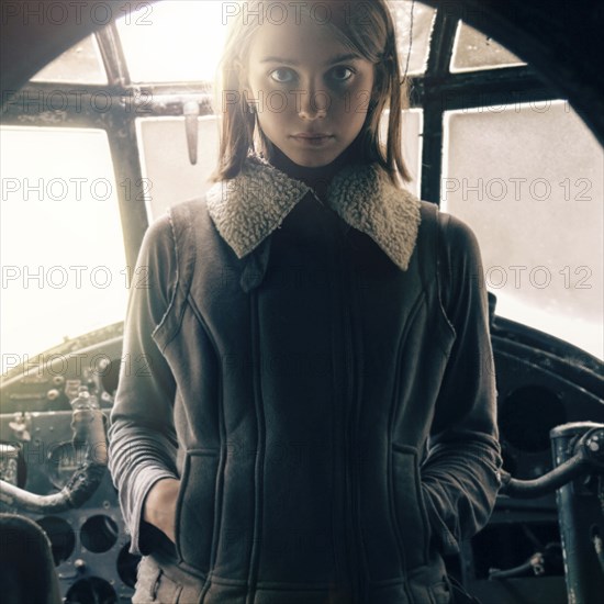 Caucasian woman standing in cockpit