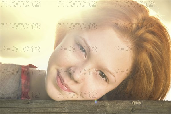 Close up of smiling Caucasian teenage girl