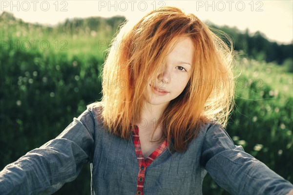 Portrait of smiling Caucasian teenage girl