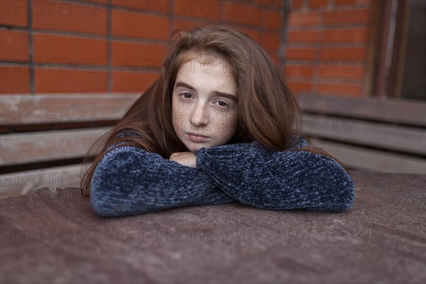 Board Caucasian girl leaning on table