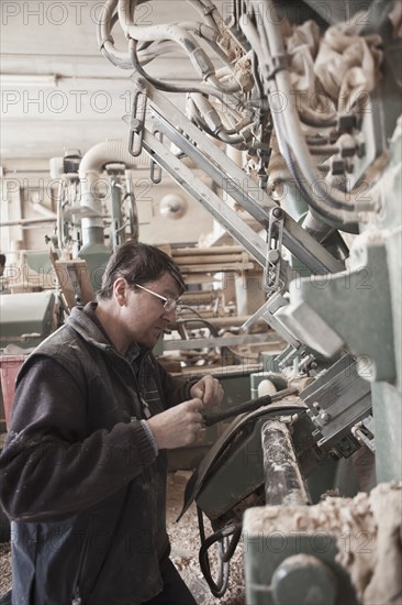 Carpenter working in woodshop