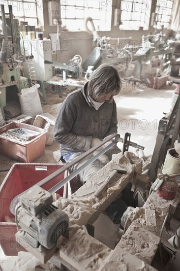 Carpenter working in woodshop