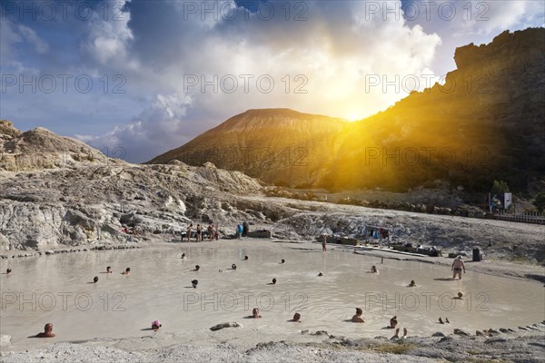 People bathing in hot springs