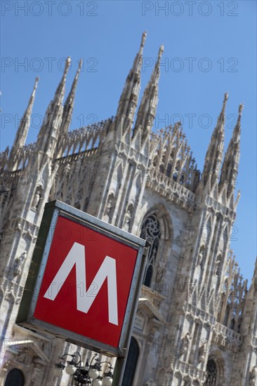 'M' sign outside ornate church