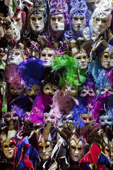 Rows of ornate masks