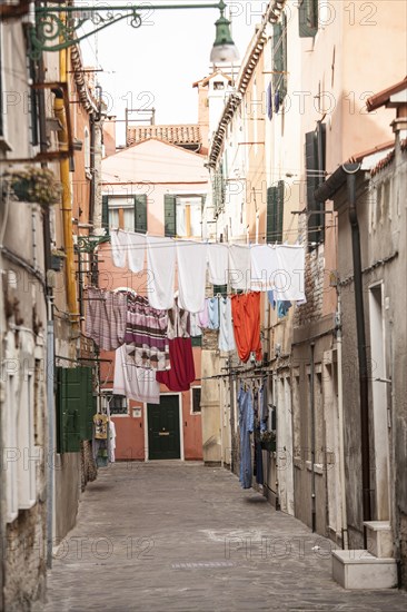 Laundry hanging over village street