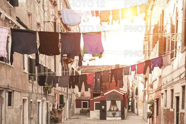 Laundry hanging from apartment buildings