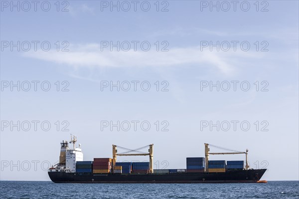 Cargo ship in ocean