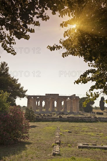 Sun rising over ancient ruins