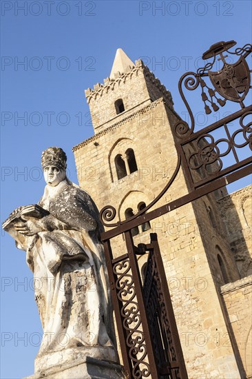 Old statue outside ornate building