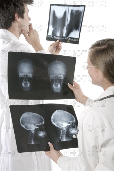 Doctors examining x-rays in hospital