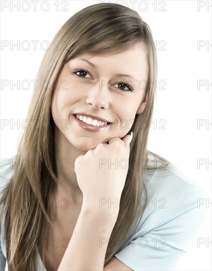 Hispanic woman resting chin in hand