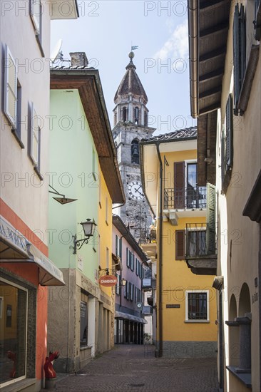 Church tower over village street