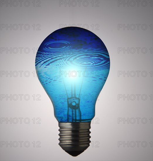 Blue water rippling in lightbulb