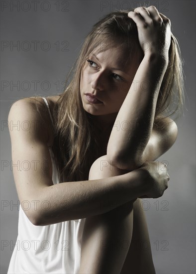 Pensive Caucasian woman