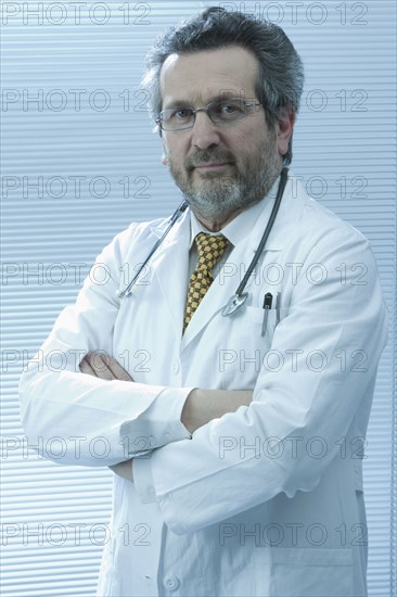 Portrait of Caucasian scientist with arms crossed