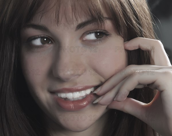 Close up of smiling Caucasian woman