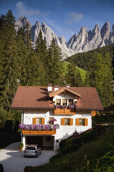 House in remote mountain landscape