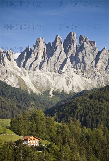 House in remote mountain landscape