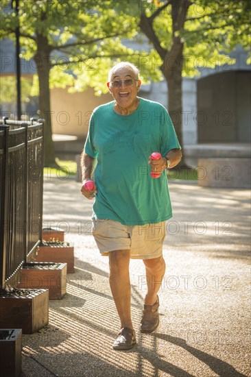 Hispanic man walking in park