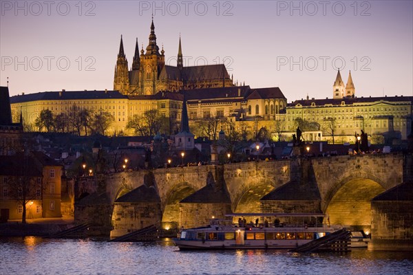 Boat in river at night in Prague