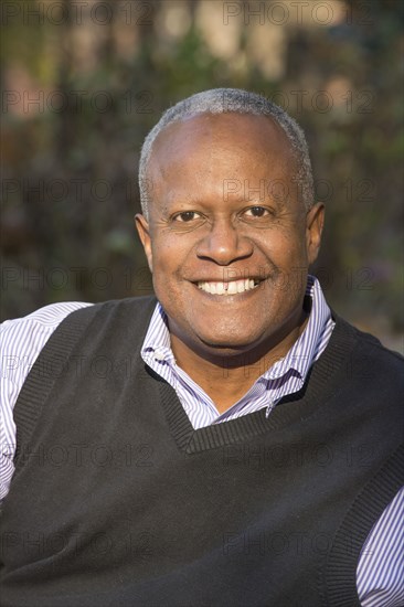 Portrait of African American man smiling outdoors