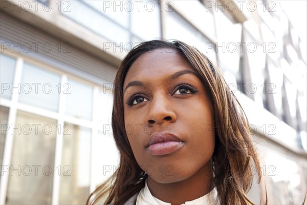 African woman looking pensive