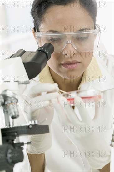 Woman studying in lab