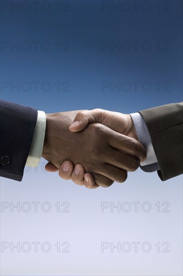 Close up of businessman's handshake