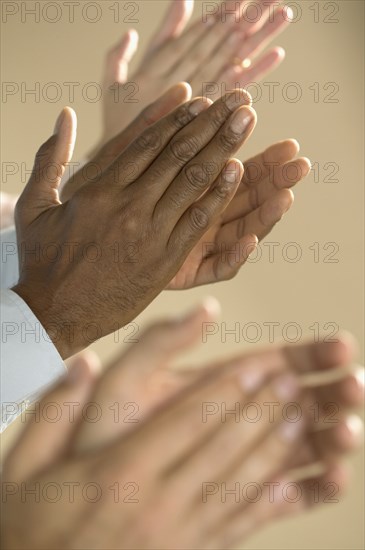 Close up of hands clapping