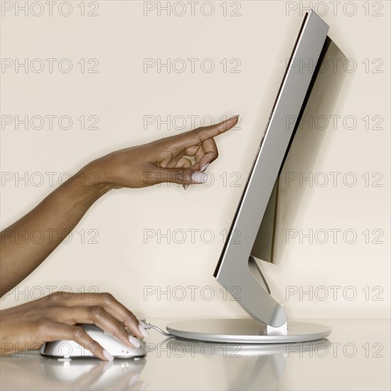 Hands working on computer