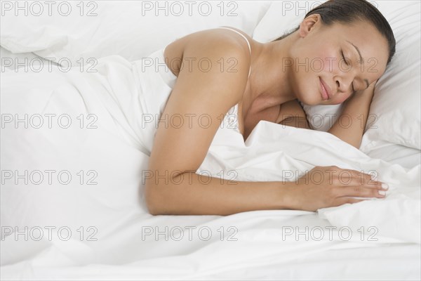 Woman asleep in bed