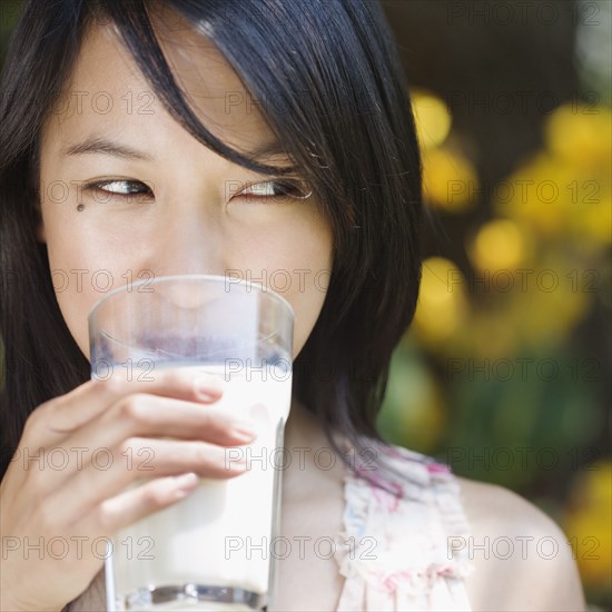 Woman drinking glass of milk