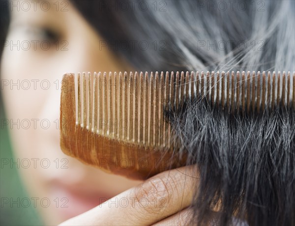 Close up of comb in woman's hair