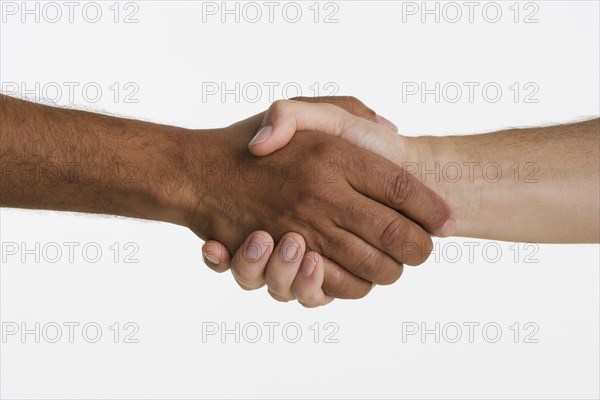 Close up of two hands shaking