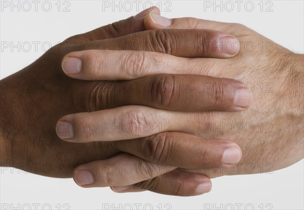 Close up of two hands interlocking