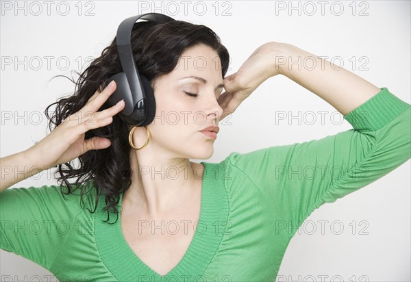 Woman listening to music on headset