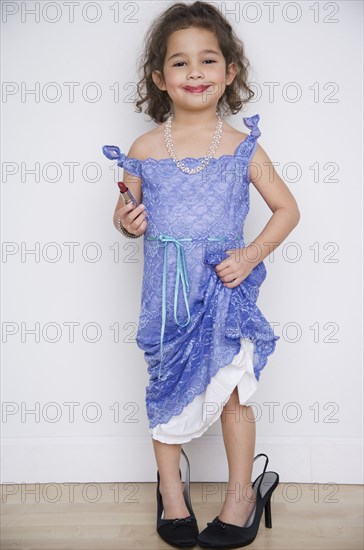 Portrait of girl playing dress up