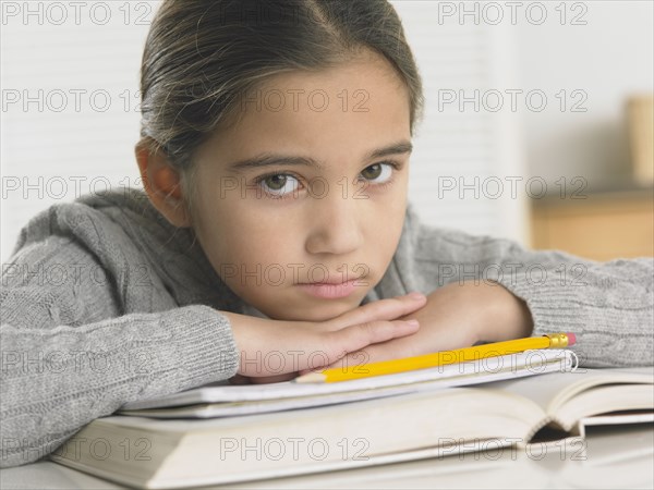 Young girl doing her homework