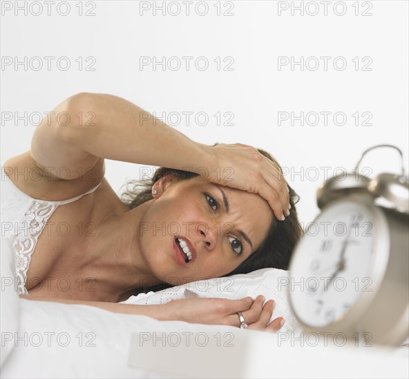 Young woman waking up