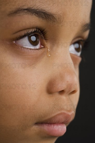 Young girl crying