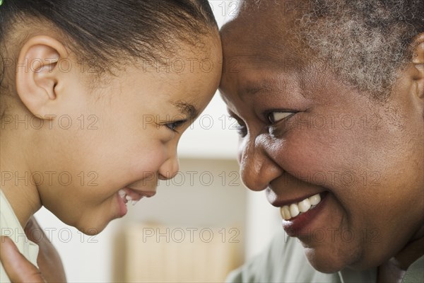 Senior woman smiling at her granddaughter