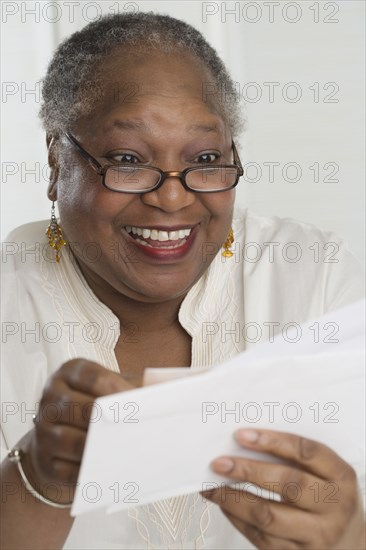 Senior woman checking her mail