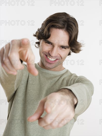 Hispanic man pointing