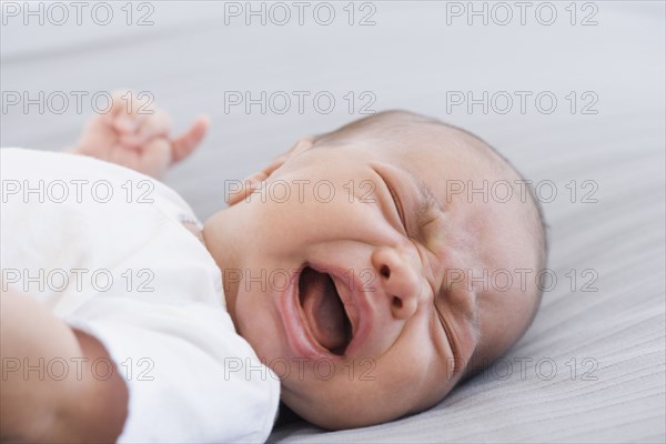 Close up of crying newborn baby
